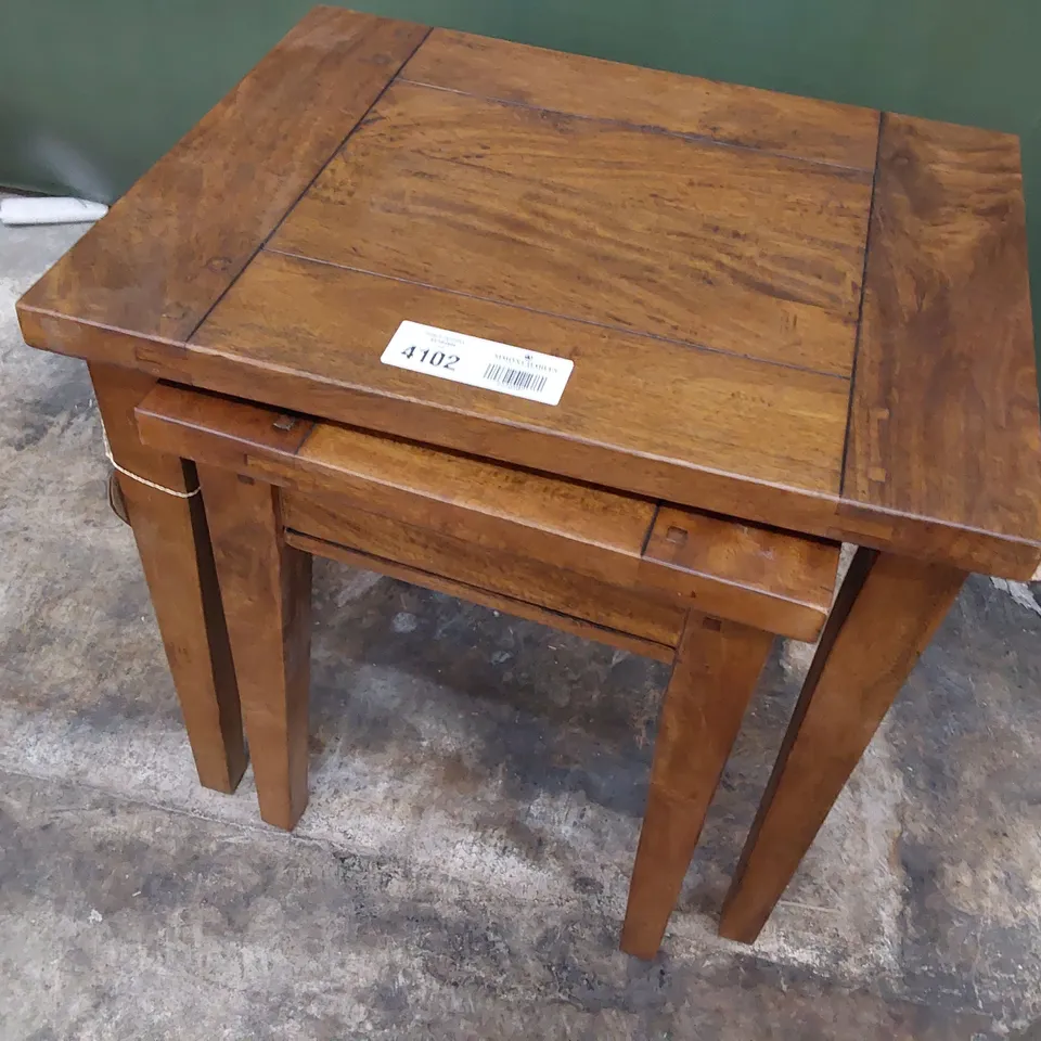 NEST OF TWO DESIGNER MANGO WOOD TABLES