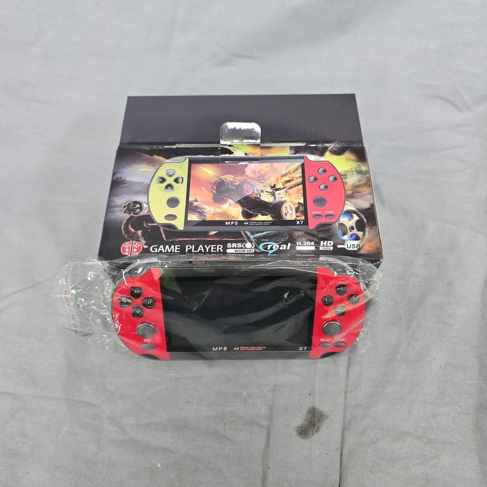 HANDHELD GAME CONSOLE WITH RED SIDE CONTROLLERS – BOXED (MP5 X7)