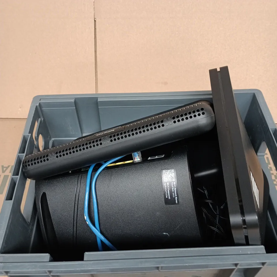 TOTE OF APPROXIMATELY 4 WIFI ROUTERS AND CABLES 