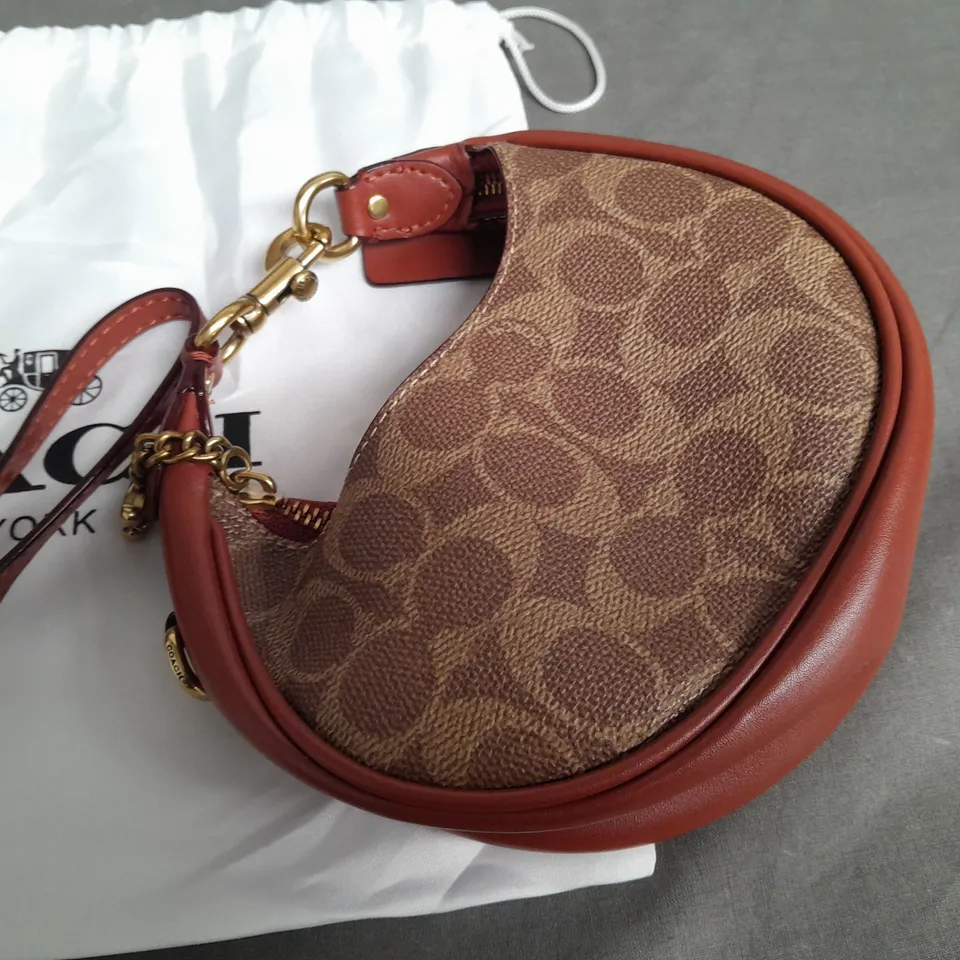 COACH ROUND MINI BAG IN BROWN