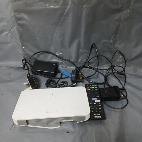 BOX OF APPROXIMATELY 20 ASSORTED ELECTRICAL ITEMS TO INCLUDE BROADBAND HUB, REMOTE CONTROLS AND POWER CABLES