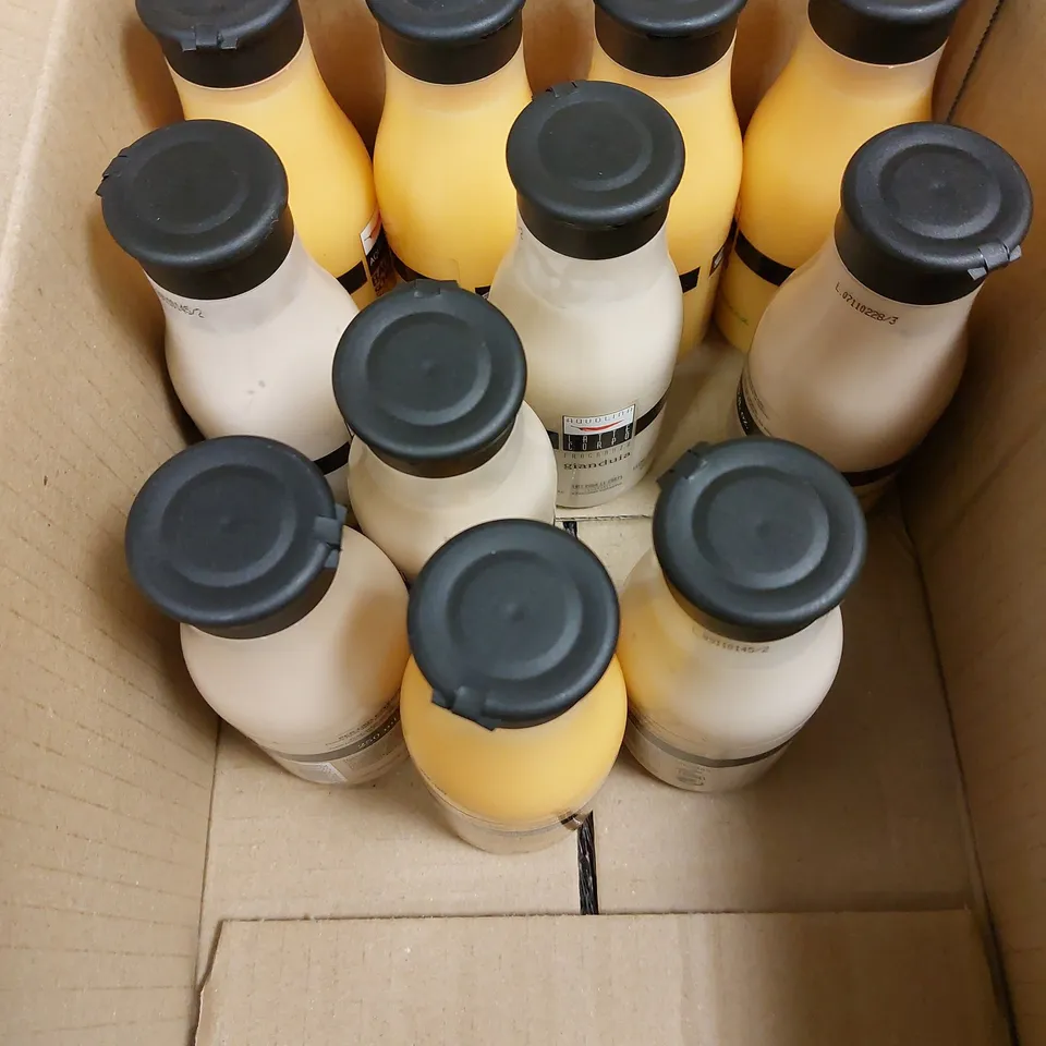 BOX OF APPROXIMATELY 10 ASSORTED AQUOLINA BATH FOAM/BODY MILK CREAMS TO INCLUDE PEACH, RASPBERRY JAM, HAZELNUT CHOCOLATE 