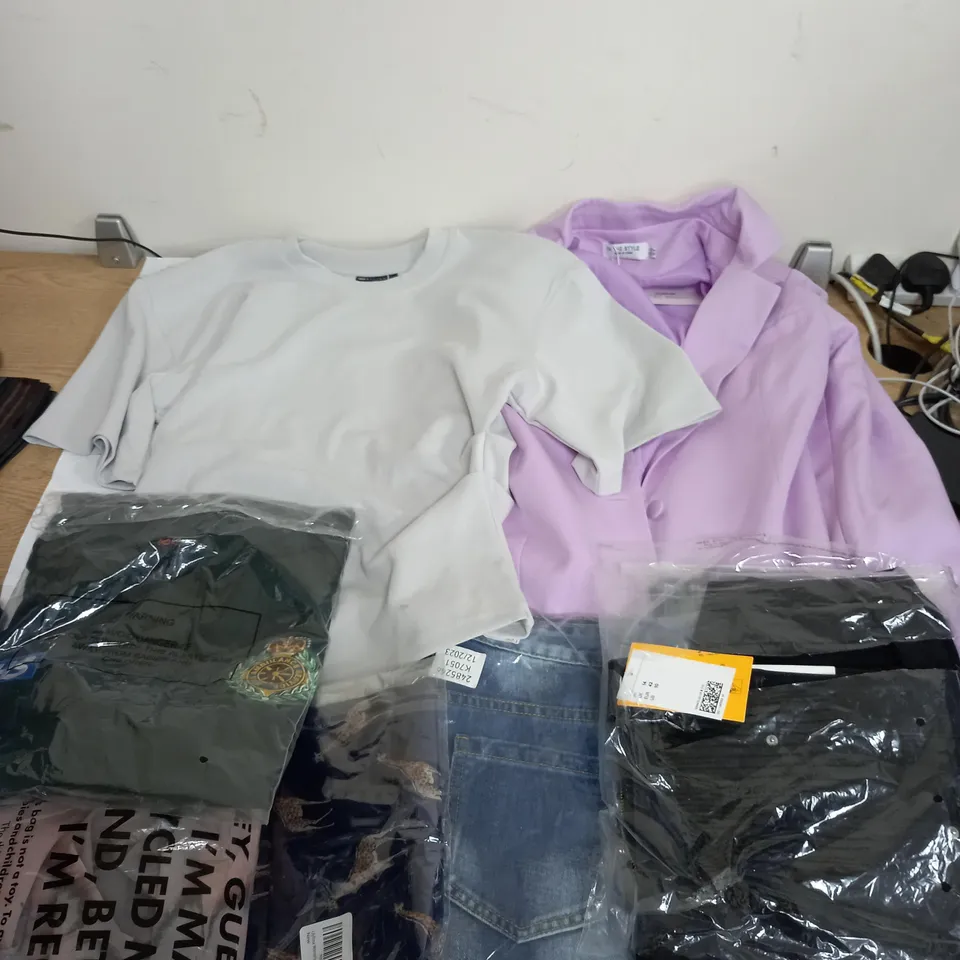LARGE BOX OF ASSORTED CLOTHING ITEMS IN VARIOUS COLOURS AND SIZES INCLUDING TROUSERS , TOPS AND JUMPERS 