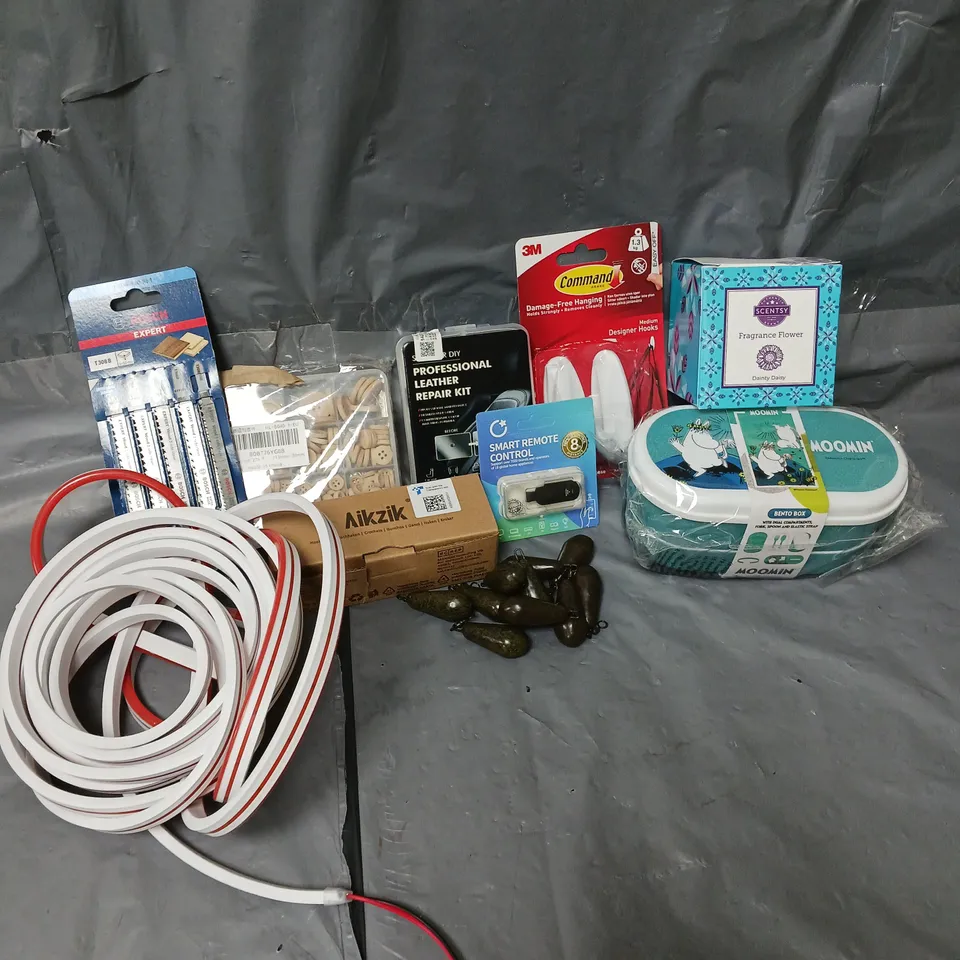 APPROXIMATELY 12 ASSORTED HOUSEHOLD ITEMS TO INCLUDE FISHING WEIGHTS, SCENTY FRAGRANCE FLOWER, LEATHER REPAIR KIT, ETC