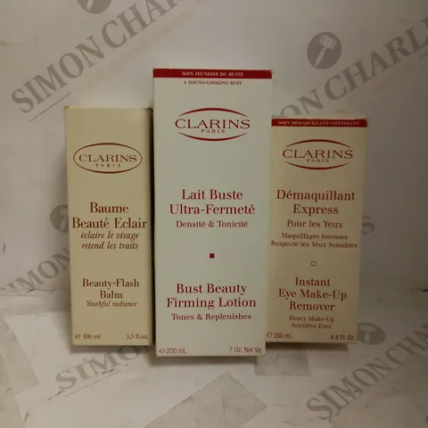 LOT OF 3 ASSORTED CLARINS PRODUCTS TO INCLUDE BEAUTY FLASH BALM 50ML, BUST BEAUTY FIRMING LOTION 200ML, EYE MAKUP REMOVER 200ML