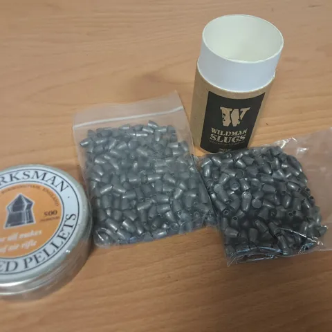 LOT OF 3 ASSORTED PACKS OF AMMUNITION INCLUDES WILMA SLUGS AND MARKSMAN PELLETS