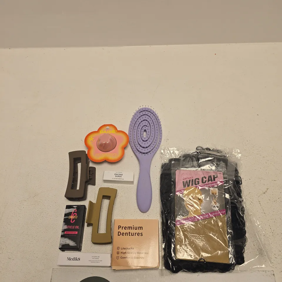 TOTE OF APPROXIMATELY 10 ASSORTED BEAUTY PRODUCTS INCLUDING DAISE JUICY POMEGRANATE HYDRATING LIP BALM, A DELUXE WIG CAP AND NOVACLEAR WHITENING ARMPIT ROLL ON