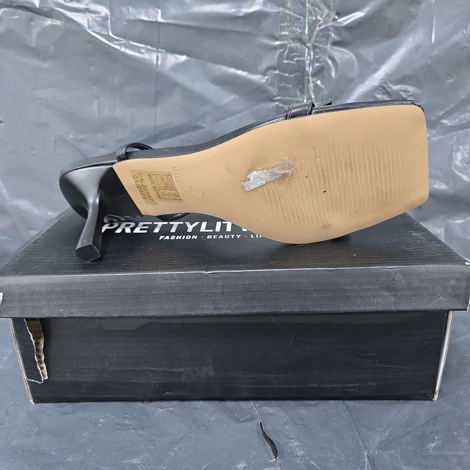 BOXED PAIR OF  PRETTY LITTLE THING OPEN TOE STILETTO HEELS IN BLACK SIZE UK 7