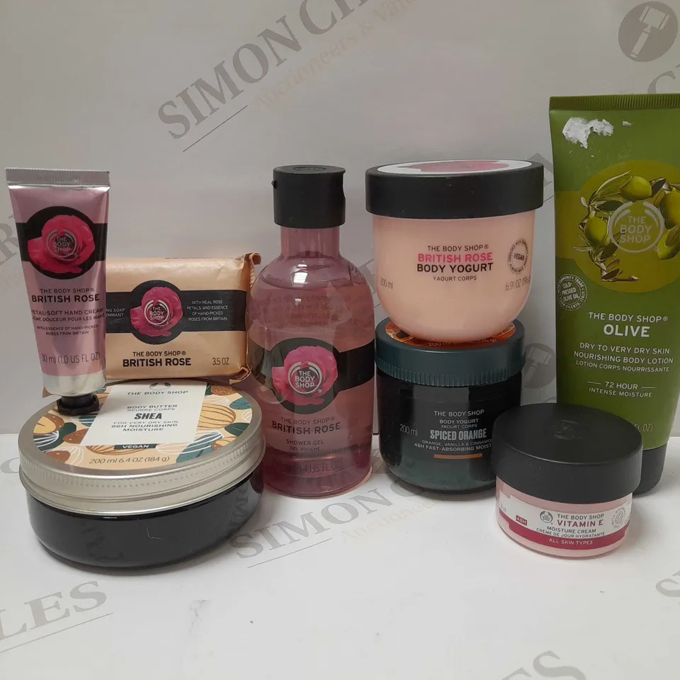 LOT OF APPROX 8 ASSORTED THE BODY SHOP PRODUCTS TO INCLUDE VITAMIN E MOISTURE CREAM, BRITISH ROSE BODY YOGURT, SHEA BODY BUTTER, ETC