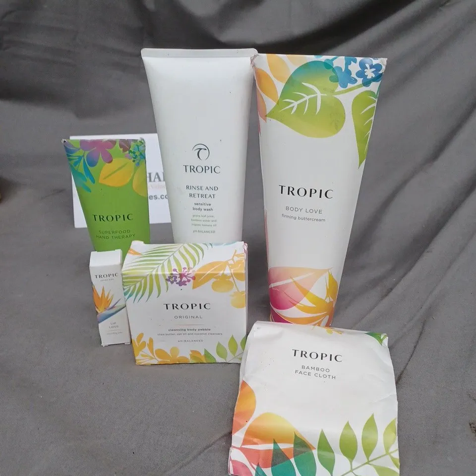 LOT OF 6 TROPIC SKIN CARE PRODUCTS TO INCLUDE BODY WASH, LIP OIL AND A BAMBOO FACE CLOTH