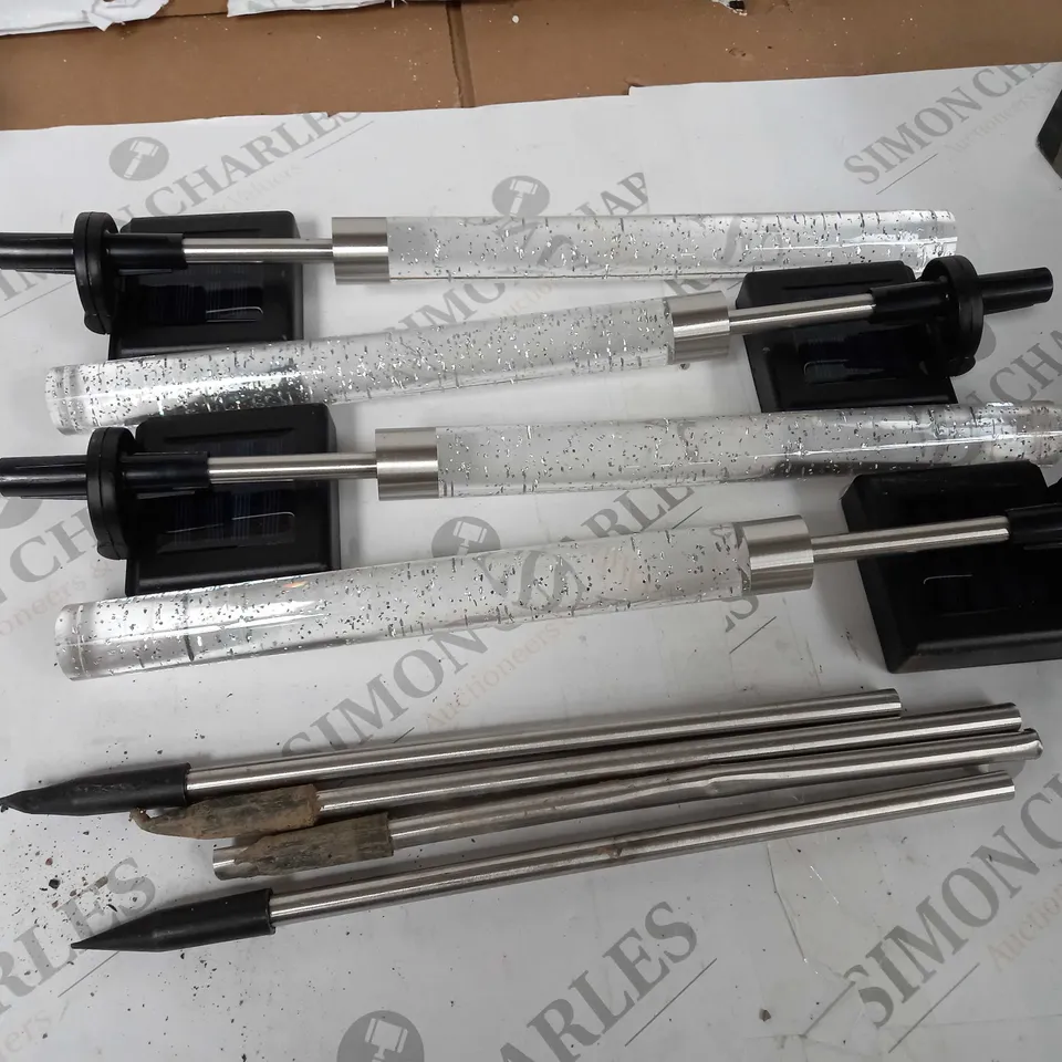 BELL & HOWELL GLIMMER STICKS SET OF 4 SOLAR PATHWAY LIGHTS
