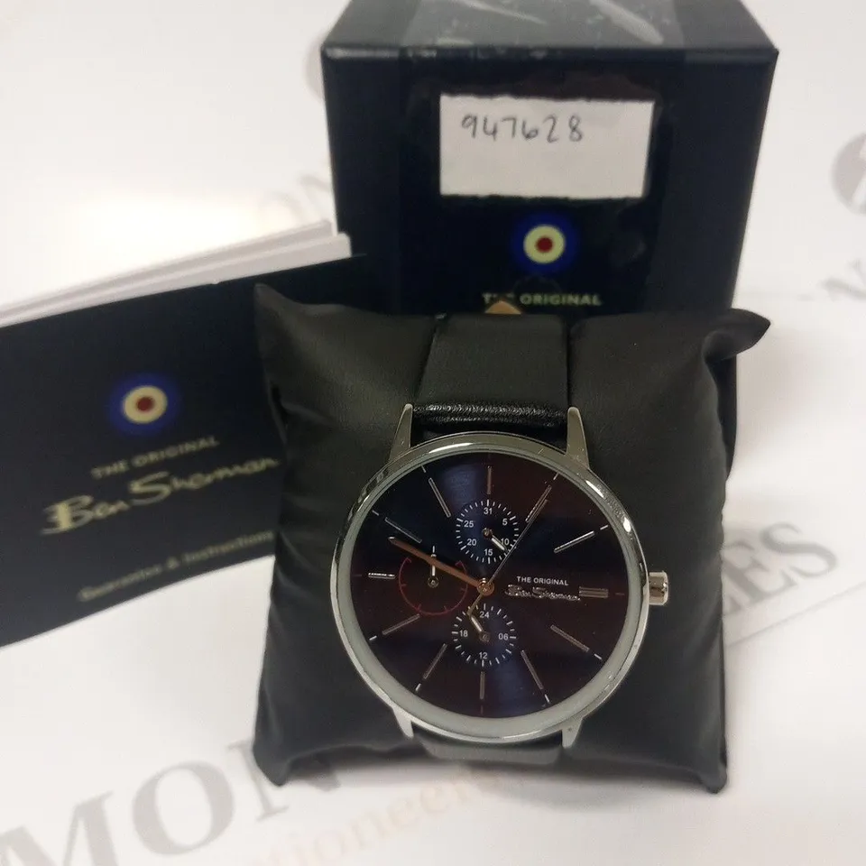 BOXED BEN SHERMAN BLACK LEATHER WRIST WATCH WITH NAVY FACE