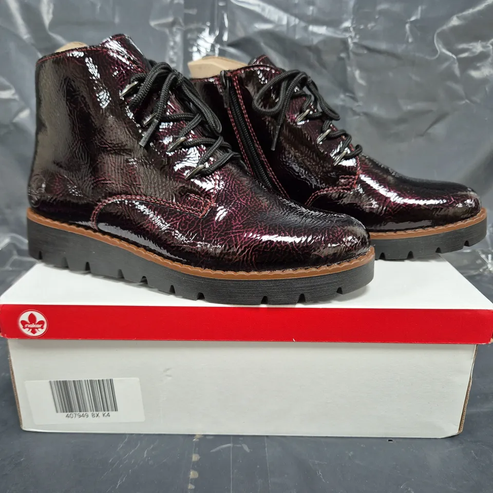 BOXED PAIR OF RIEKER LOW WEDGE BOOTS IN BORDEAUX SIZE 4
