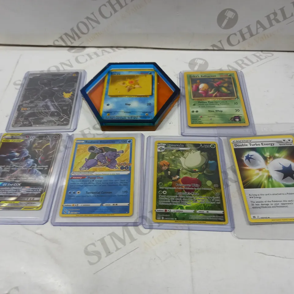 APPROXIMATELY 15 ASSORTED POKEMON CARDS IN CASINGS TO INCLUDE; DARK CHARIZARD, MACHAMP, STARU AND ERIKA'S BELLSPROUT
