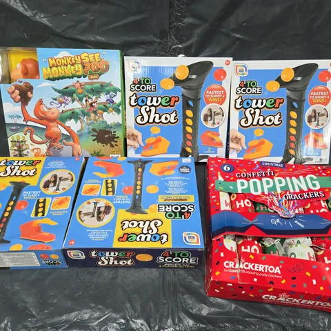 APPROXIMATELY 8 ASSORTED GAMES TO INCLUDE TOWER SHOT, MONKEY SEE MONKEY POO, AND POPPING CRACKERS ETC.