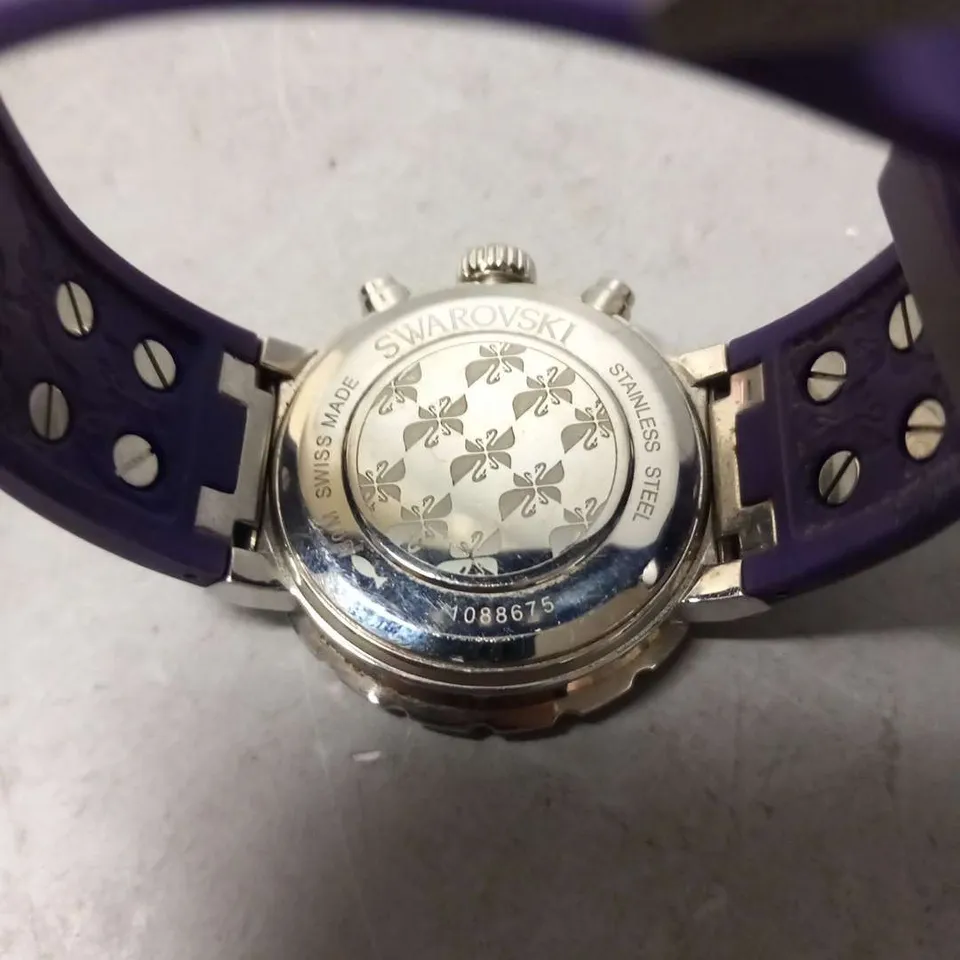 SWAROVSKI 1088675 STAINLESS STEEL 50M SWISS MADE WRIST WATCH AND PURPLE RUBBER STRAP 