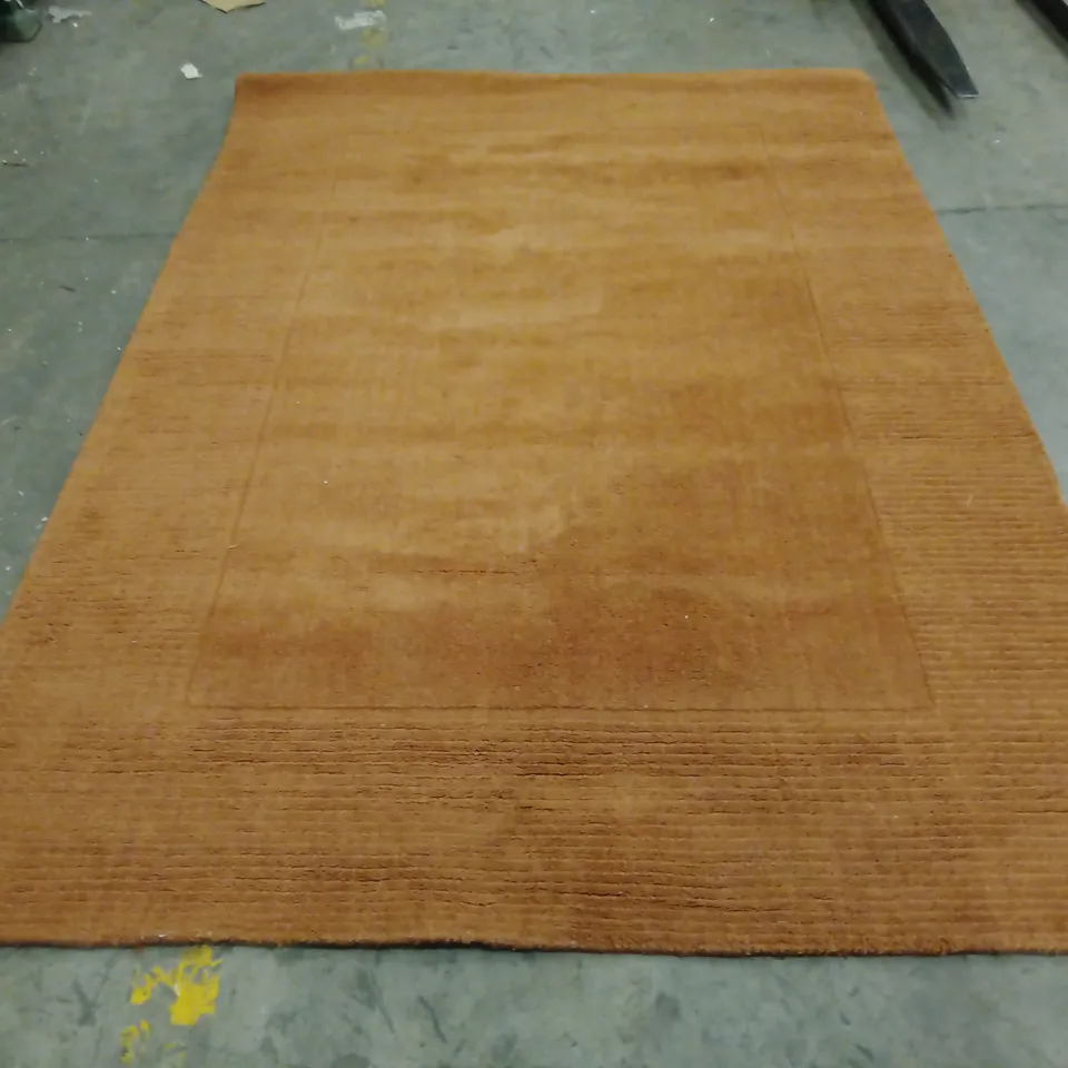 STILLAGE OF APPROXIMATELY 20 DESIGNER RUGS
