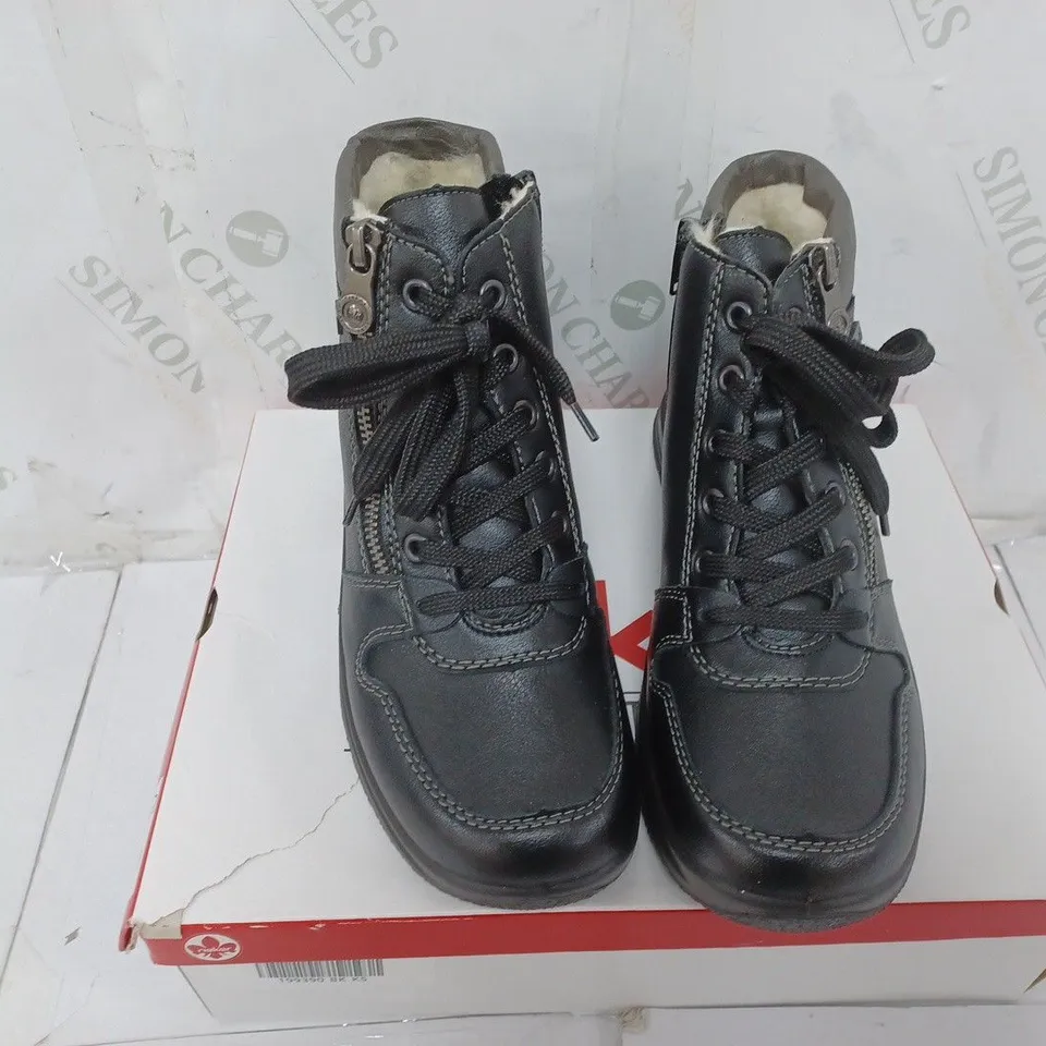 BOXED PAIR OF RIEKER WATER RESISTANT BOOTS IN BLACK SIZE 5