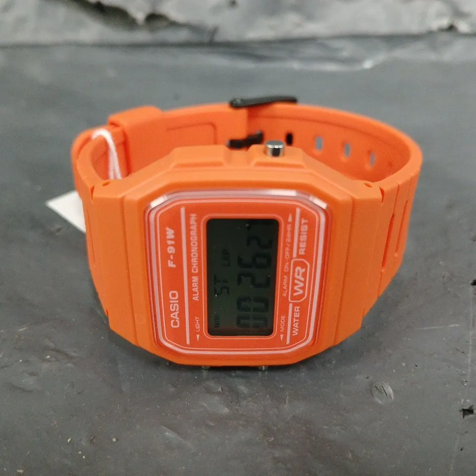 BOXED CASIO CLASSIC DIGITAL LCD WATCH IN ORANGE