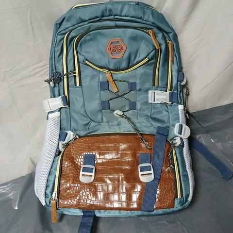 TEAL BACKPACK WITH BROWN FAUX CROCODILE POCKET AND MULTIPLE ZIP COMPARTMENTS, PLUS USB OUTLET