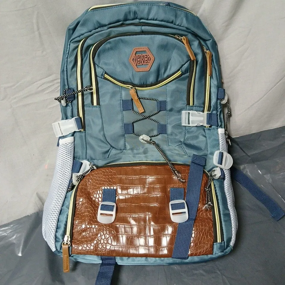 TEAL BACKPACK WITH BROWN FAUX CROCODILE POCKET AND MULTIPLE ZIP COMPARTMENTS, PLUS USB OUTLET
