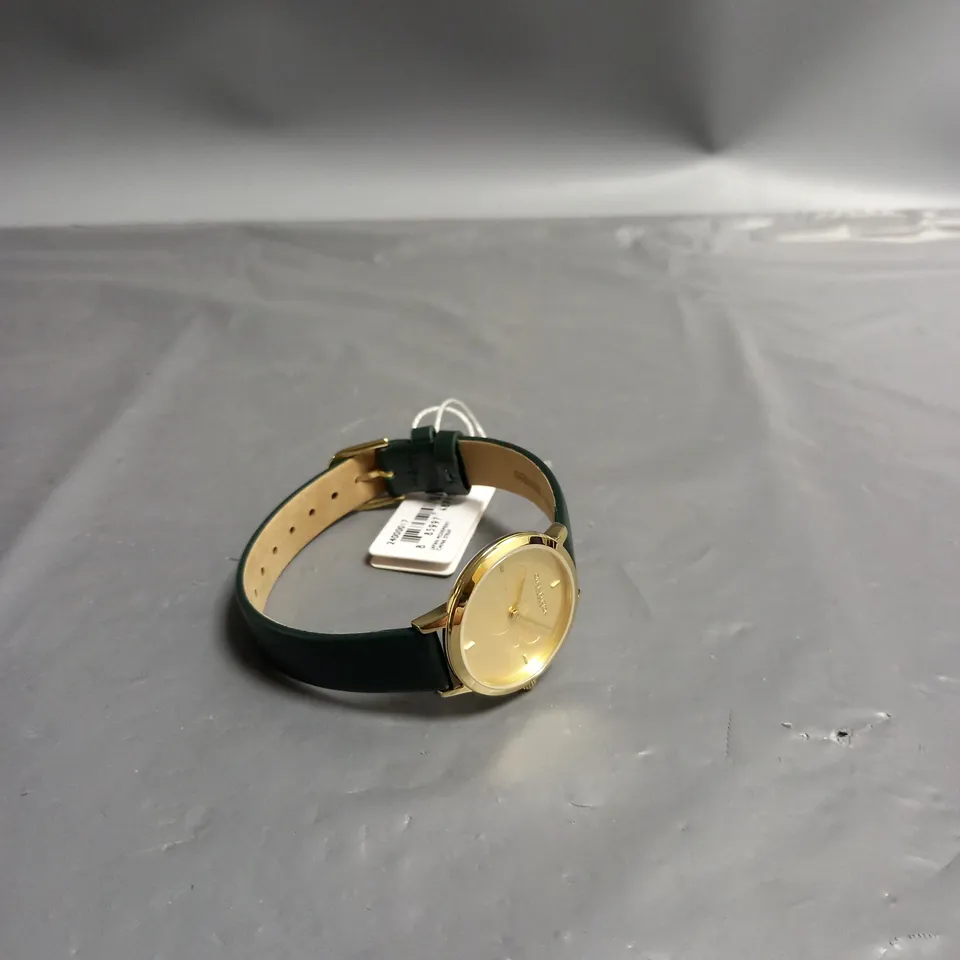 BOXED OLIVIA BURTON LONDON LADIES WATCH WITH GOLD COLOURED BEE DESIGN FACE AND GREEN LEATHER STRAP