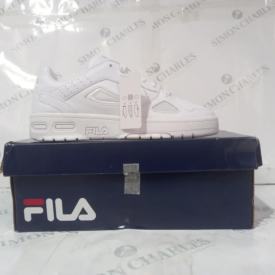 BOXED PAIR OF FILA SHOES IN WHITE UK SIZE 5