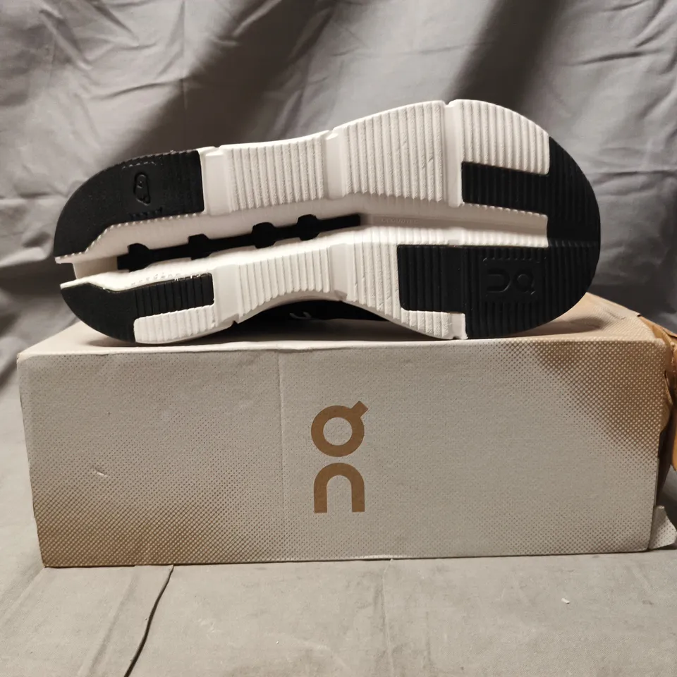 BOXED PAIR OF ON CLOUDNOVA SHOES IN PHANTOM/WHITE SIZE UK 7.5