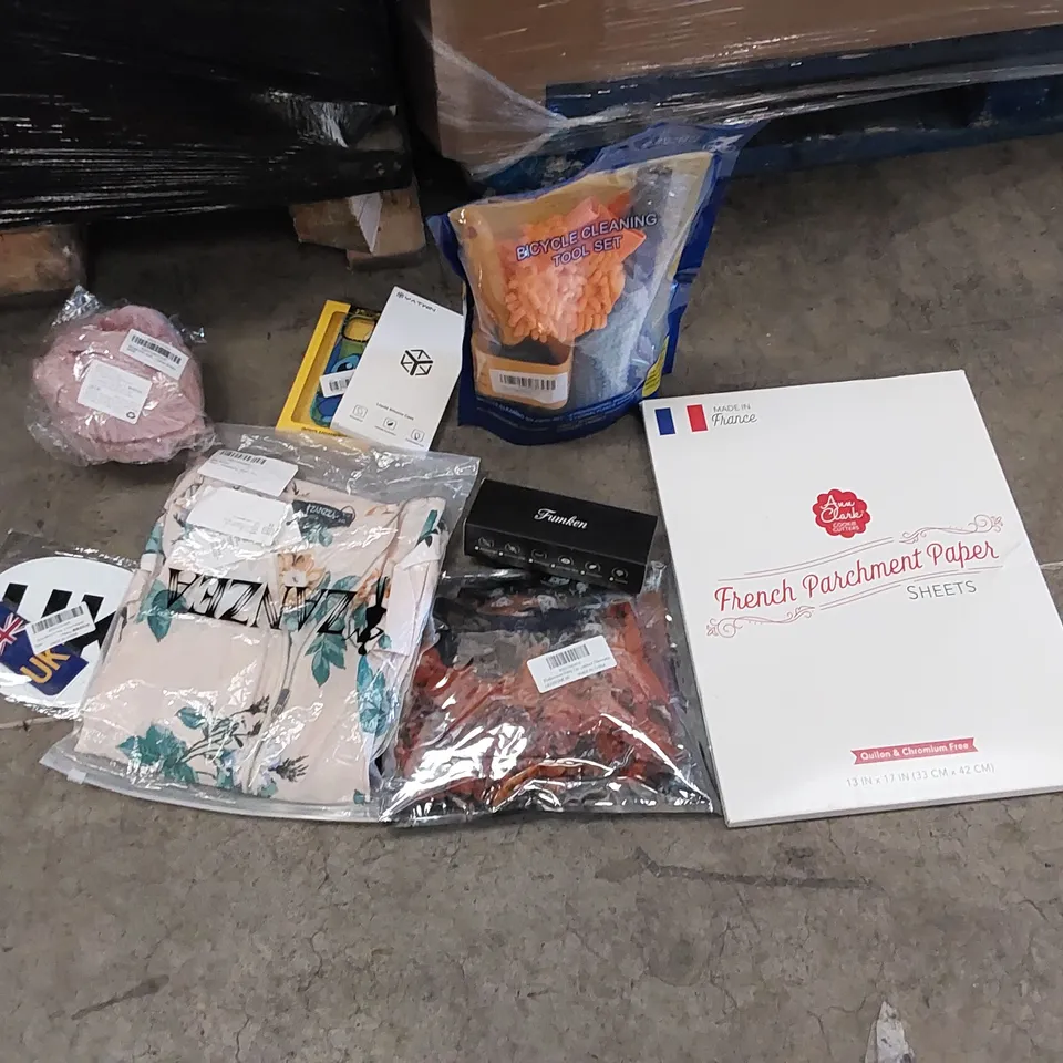 PALLET OF ASSORTED ITEMS INCLUDING: CLOTHING, HALLOWEEN DECORATIONS, BICYCLE CLEANING TOOL SET, PHONE CASE, EAR MUFFS, FRENCH PARCHMENT PAPER, CAR STICKERS
