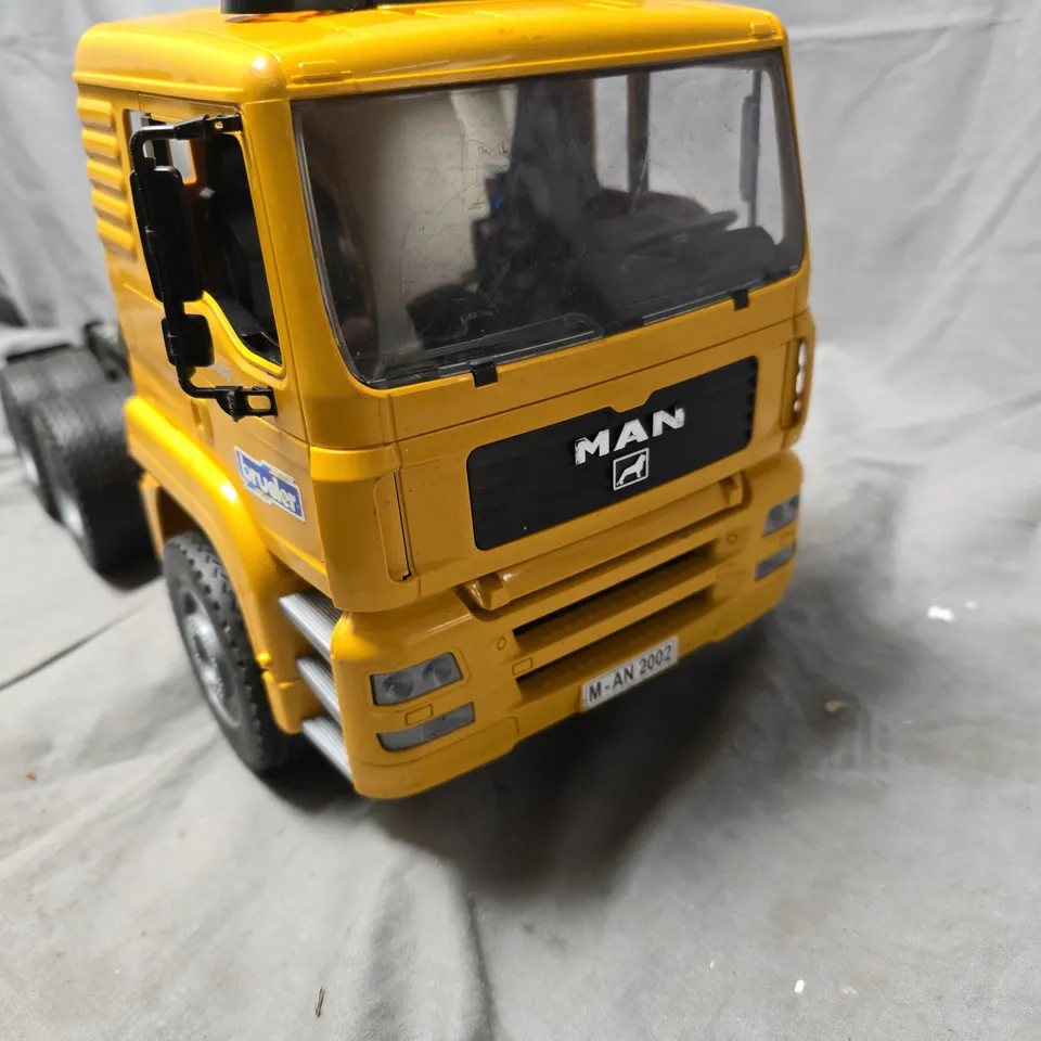 BRUDER MAN TGA 4144D TOY TRUCK – YELLOW