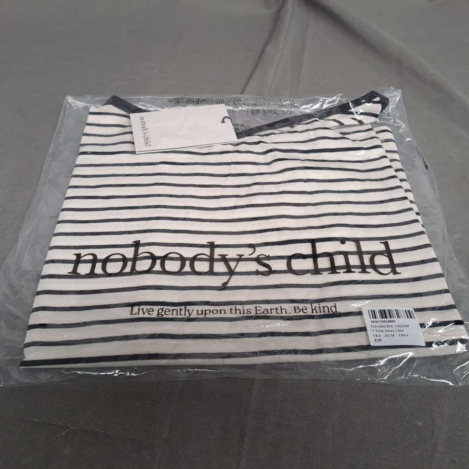 BAGGED NOBODYS CHILD V-NECK JERSEY SIZE 8