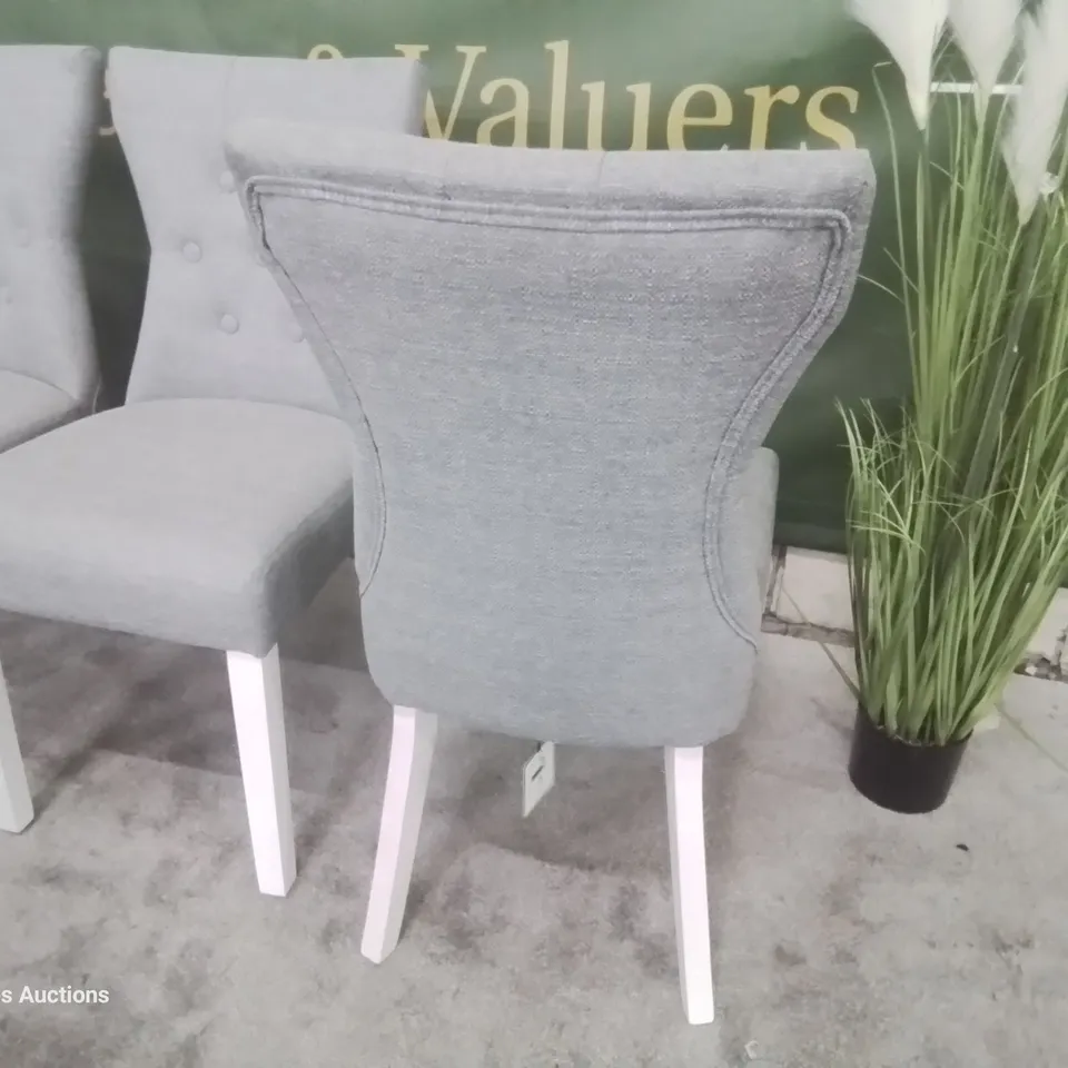 SET OF FOUR BEWLEY UPHOLSTERED BUTTONED BACK DINING CHAIRS LIGHT GREY FABRIC WHITE LEGS