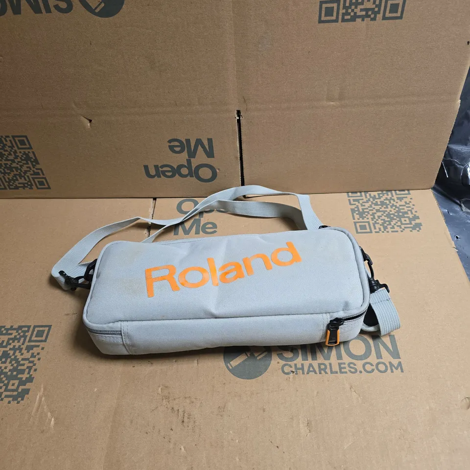 ROLAND TB-03 BASS LINE COMPUTER CONTROLLED SYNTHESIZER IN GREY BAG WITH STRAP AND INSTRUCTIONS