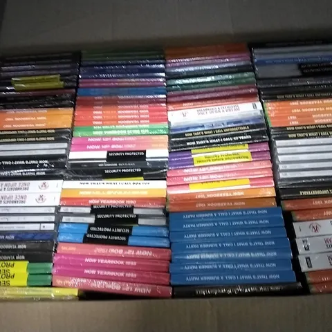 APPROXIMATELY 100 ASSORTED CDS AND DVDS TO INCLUDE NOW MUSIC 18, NOW YEARBOOK, AND NOW THAT'S WHAT I CALL ETC.