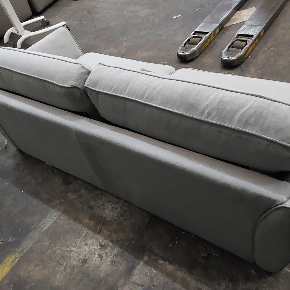 DESIGNER LARGE SOFA UPHOLSTERED IN FABRIC 