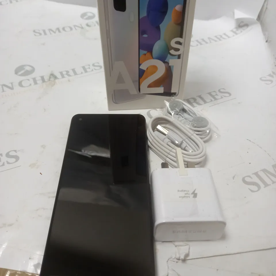 BOXED SAMSUNG A21 PHONE WITH HEADPHONES AND CHARGER
