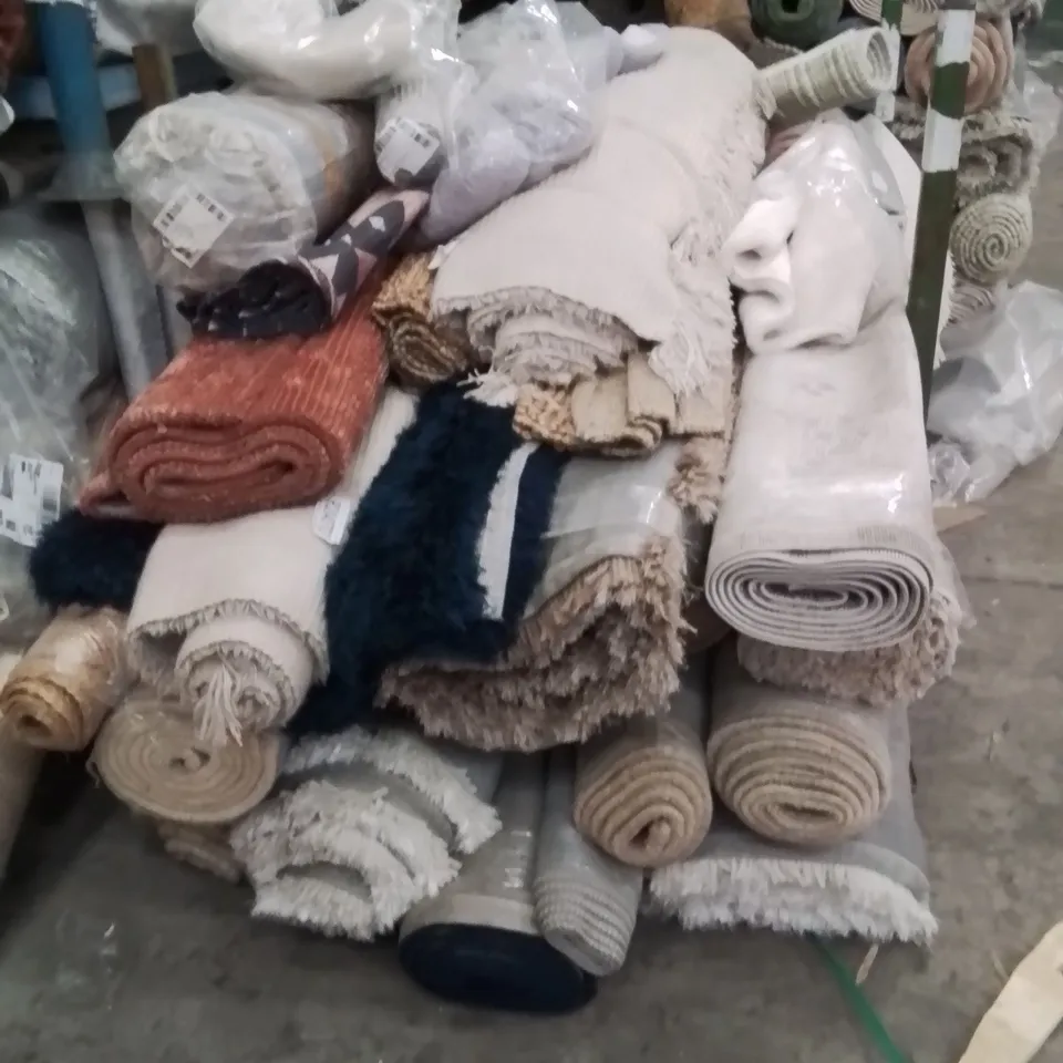 STILLAGE OF APPROXIMATELY 20 QUALITY DESIGNER RUGS