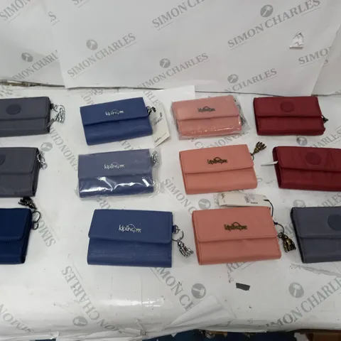 12 KIPLING FOLDING WALLETS IN RED, BLUE, AND PINK 