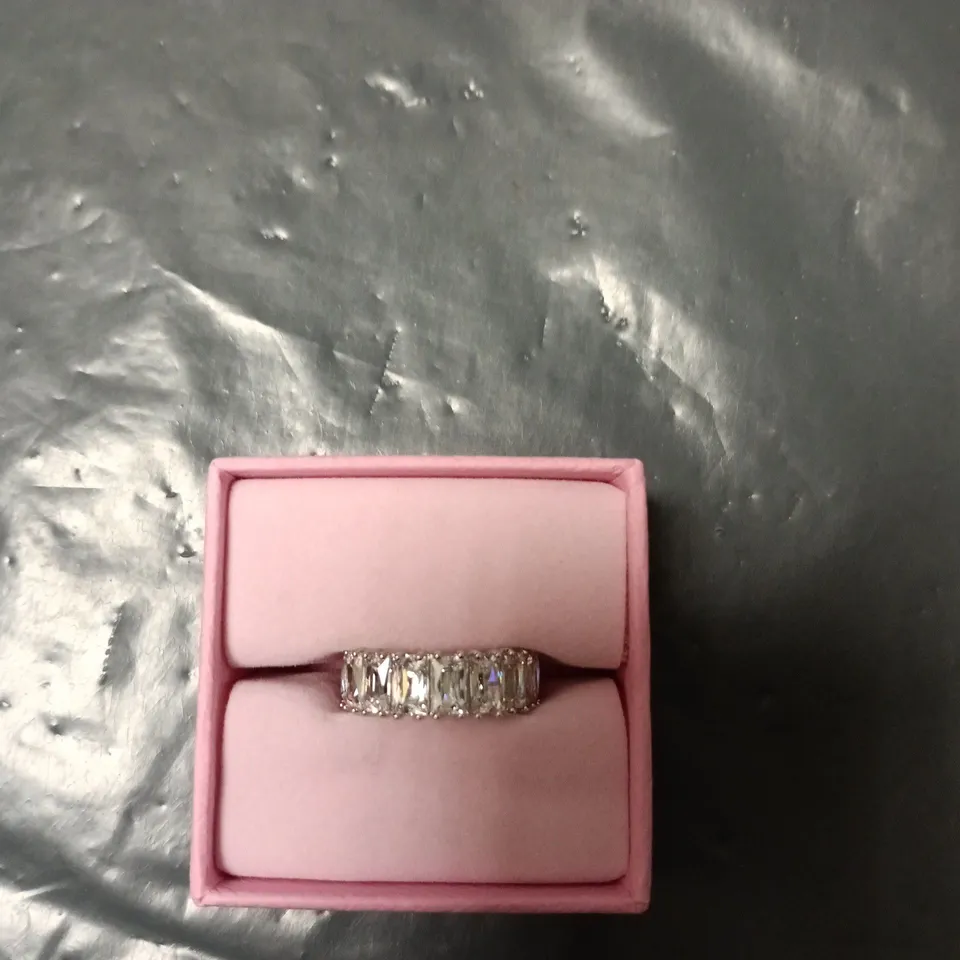 SWAROVSKI RING WITH BAGUETTE-CUT STONES AROUND THE BAND 