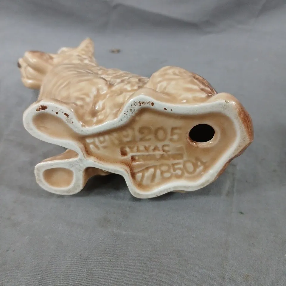 CERAMIC DOG FIGURINE, SEATED WITH BEIGE GLAZE AND BROWN SHADING