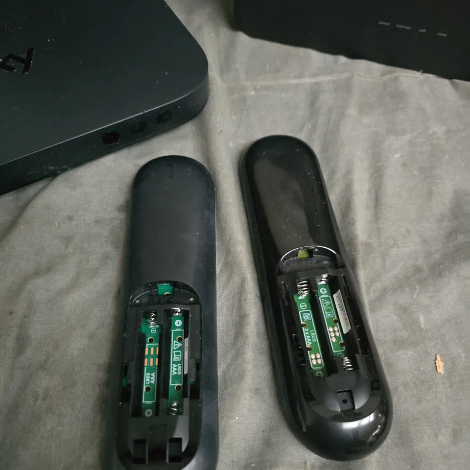 SKY TV SET-TOP BOXES AND WIFI ROUTERS WITH TWO REMOTES – INCLUDES POWER ADAPTER X 3 ITEMS.