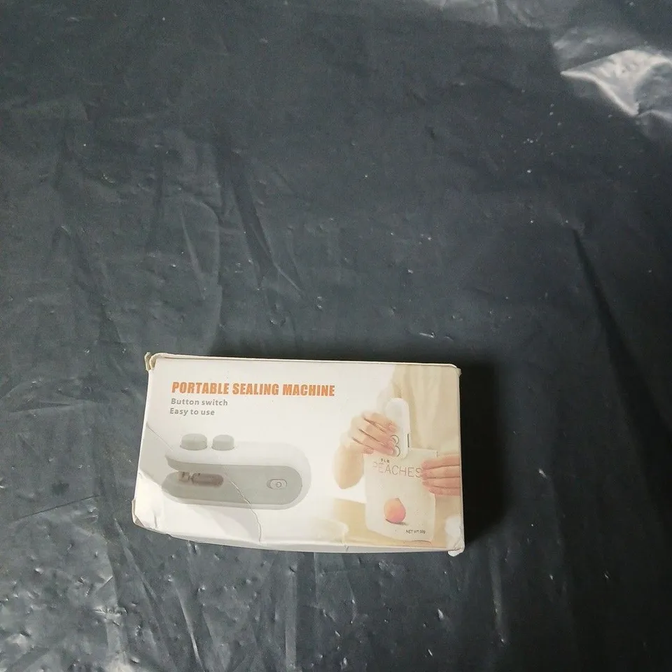 APPROXIMATELY 15 ASSORTED HOUSEHOLD ITEMS INCLUDING HAND WARMERS , COASTERS AND PORTABLE SEALING MACHINE 