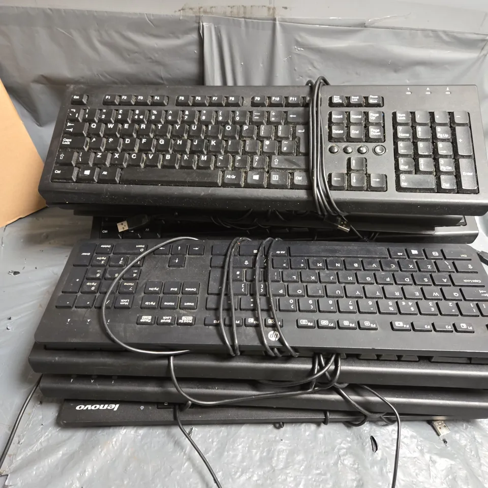 APPROXIMATELY 11 UNBOXED KEYBOARDS