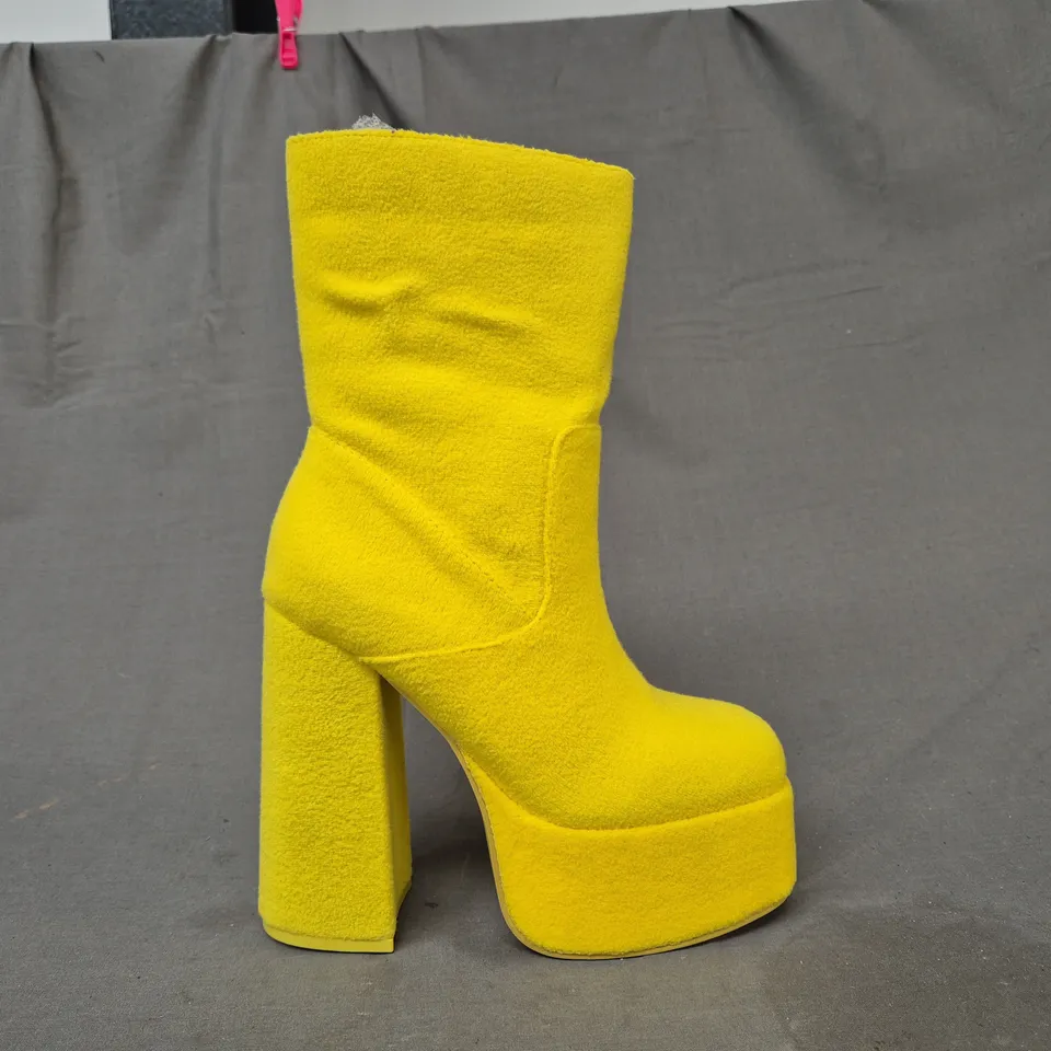 BOXED PAIR OF KOI TELETUBBIES PLATFORM BLOCK HEEL BOOTS IN YELLOW UK SIZE 3