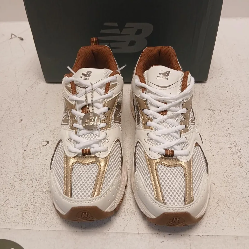 NEW BALANCE RUNNING SHOES – WHITE & GOLD, UK 6.5 (US 7.5)