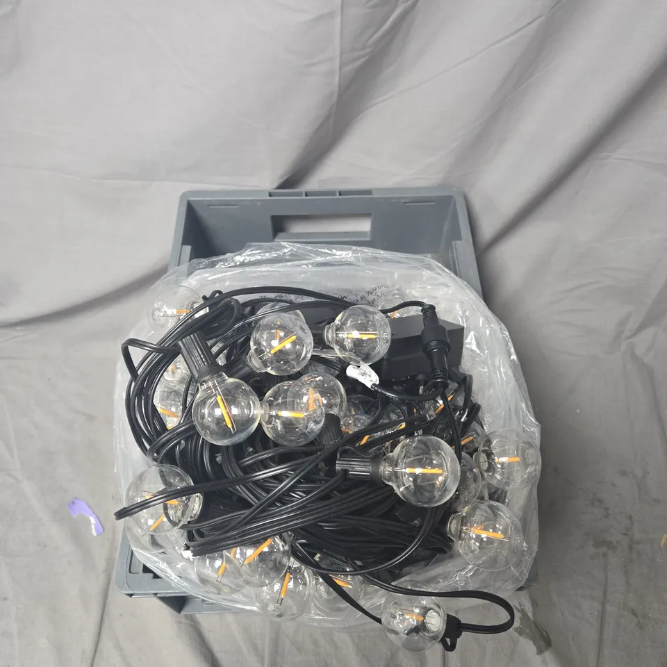 STRING LIGHTS WITH CLEAR GLOBE BULBS ON BLACK CORD – DECORATIVE LIGHTING