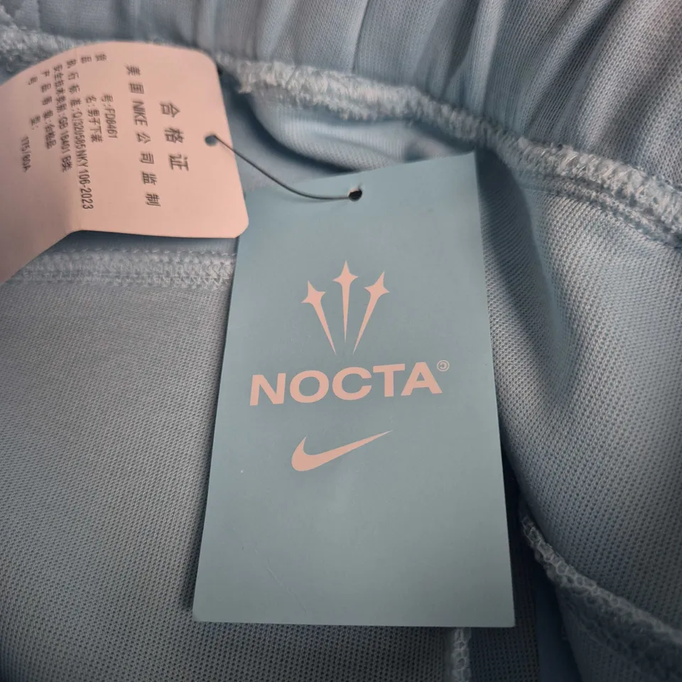 NIKE NOCTA MEN'S TRACK PANTS – LIGHT BLUE (FD8461-480), SIZE L