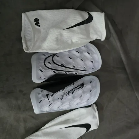 NIKE MERCURIAL LITE SHIN GUARDS – WHITE, WITH SLEEVE & STORAGE BAG