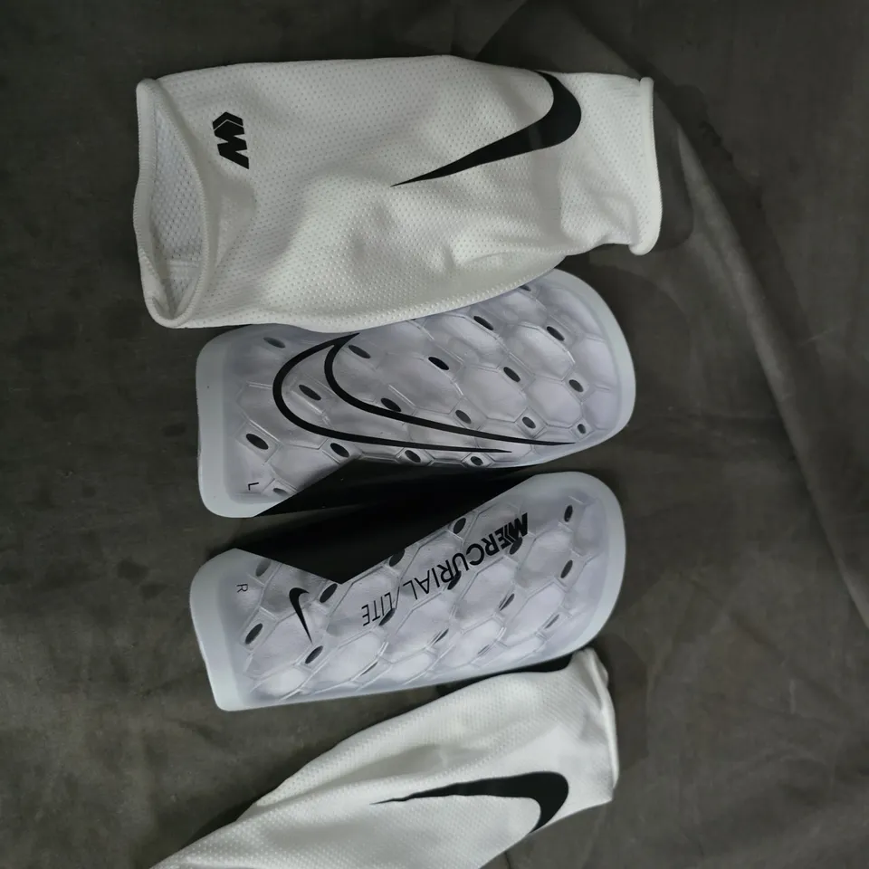 NIKE MERCURIAL LITE SHIN GUARDS – WHITE, WITH SLEEVE & STORAGE BAG