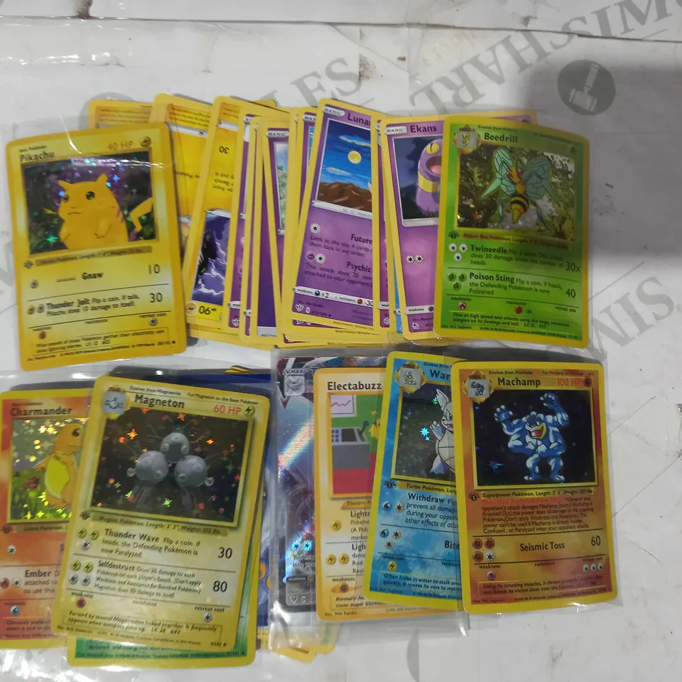 LOT OF ASSORTED POKÉMON TRAADING CARDS